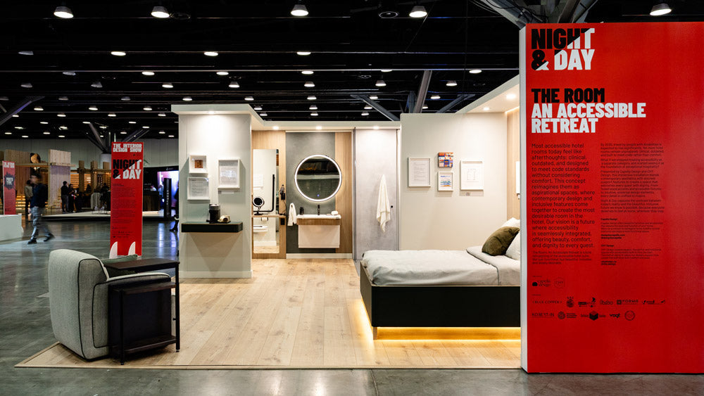A wide view of an accessible hotel room suite installation at a trade show