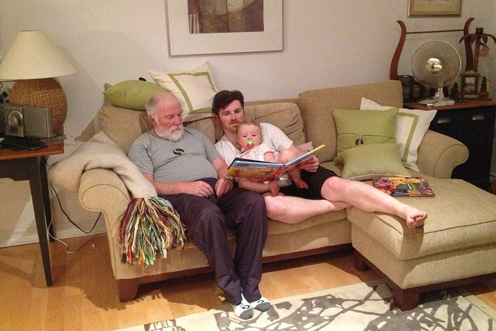 Co-Founder Patrick and his family sitting on a couch