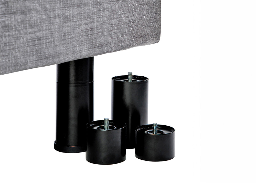 Black furniture legs on a white background